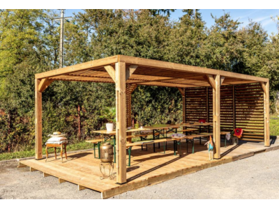 Pergola bois XXL thermauvent thermo chauffé avec ventelles mobile sur mur